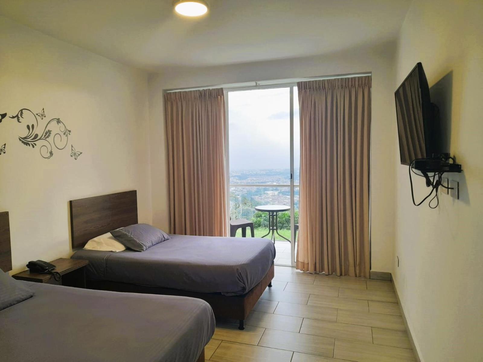 Hotel Entre Lomas ซานตาโรซา เดกาบัล ภายนอก รูปภาพ